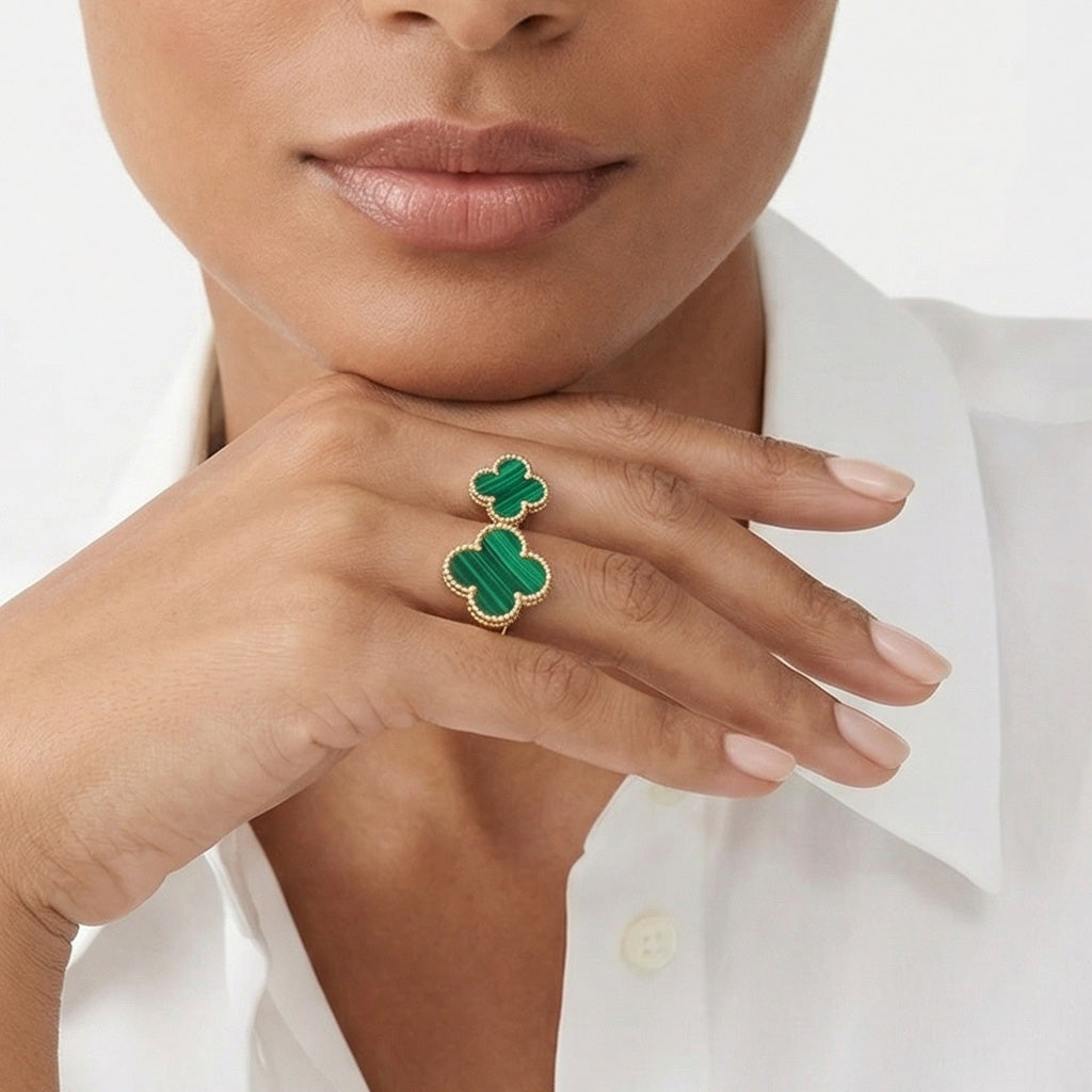 Green Clover Between The Finger Ring