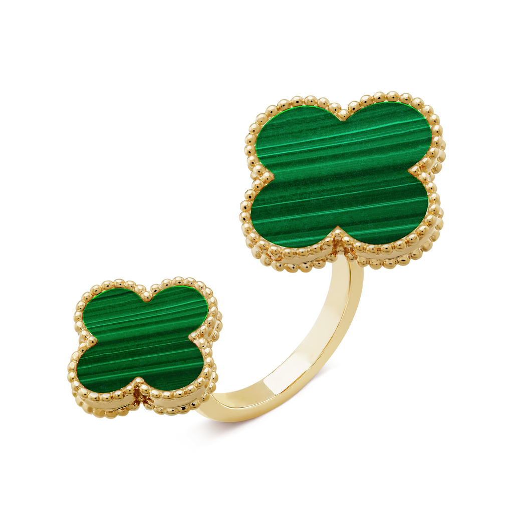 Green Clover Between The Finger Ring