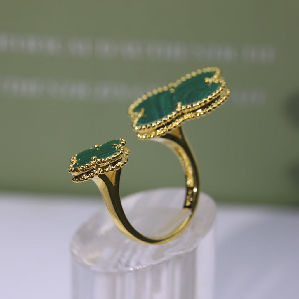 Green Clover Between The Finger Ring